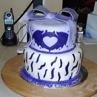 Clandestine Industries Cake This cake was made for my sister who is a HUGE pete wentz/fall out boy fan. The bat on the top cake is the logo from the clothing line pete...