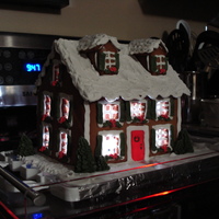 Gingerbread House My first attempt at making a gingerbread house by scratch. Found awsome website with instruction and recipe but cannot remember it now :(...