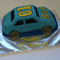 Racing Car Car cake for a 1 year old's birthday, BC Icing with star tip.Got the idea from a cake on CC just can't remember the person's...