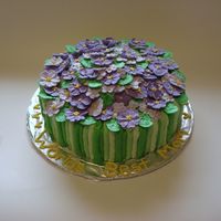 Flower Cake Cake I made for mother's day. Great Ideas borrowed from a couple of cakes on here. Cake is all buttercream with royal icing flowers.