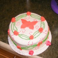 Sister In Law's Birthday Cake vanilla cake, 2 layers torted, filling with apricot buttercream, vanilla buttercream iced, fondant flowers. i finally mastered Duff's...