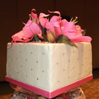 Pink Lily Cake 8" square cake, white chocolate panels over butter cream. Pink gumpaste lilies - my first time! Thank goodness for Edna's video!...