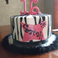 16Th Birthday Cake For Sarah 9" zebra stripe birthday cake. Modeling chocolate & fondant accents. Went a little crazy with the glitter. All the black stripes...