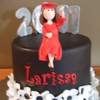 Larissa's Graduation Cake 8 inch black fondant covered cake. Gumpaste and fondant accents with gumpaste figure. Lots of glitter! TFL.