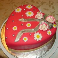 Heart Cake Covered with marzipan, gumpaste daisies, sugar pearls.