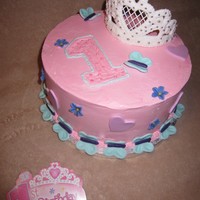 1St Birsthday I was trying to match the invitation. Buttercream with fondant accents, royal icing tiara.
