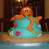 Under The Sea Cake I made this for my daughter's 2nd birthday. The octopus is rice cereal covered in fondant. The cake is bc, decorationms are bc, rbc,...