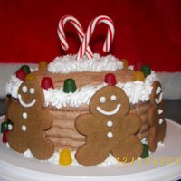 Gingerbread Man Christmas Cake This cake was pretty simple. I made chocolate buttercream icing and then used the decorative edges. The gingerbread men are from a premixed...