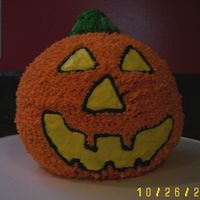 Jack-O-Lantern This is made from the sports ball. I used tip 16 star and free handed the eyes nose mouth and stem.