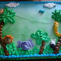 Jungle Cake Cake was tres leches with whipped cream and fondant animal faces. I really enjoyed making this cake.