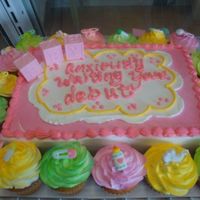 Baby Blocks I love making baby shower cakes. Cake is white with fresh strawberries and cocholate and white cupcakes.