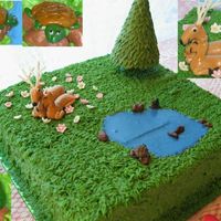 Deer In Love! Chocolate fudge cake with chocolate cream cheese buttercream filling and crumb coat, cream cheese buttercream top coat (all of the green)....