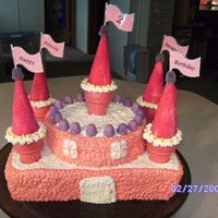 Castle Cake I made this for my niece's 2nd birthday. Half Chocolate Half White on the bottom and the round one is strawberry covered in...