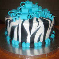 Zebra dark chocolate cake with alternating coconut and caramel fillings, BC w/ fondant accents