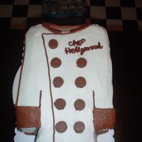 Chef's Coat Cake Two 9x13 chocolate cakes with peanut butter buttercream in the middle. Buttons are mini reeses cups cut in half
