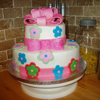 9Th Birthday Cake I made for my granddaughter's 9th birthday. Marble cake with fondant. The bow is made with a fondant/gumpaste mix.