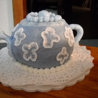 Tea Party Cake This was my first attempt at a Tea Pot. It was for a retirement party. "TEA PARTY" was the theme.