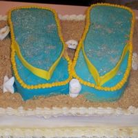 Flip Flop Cake Got this idea from woman's day magazine. then added my own touch! shells are chocolate, strap on flip flops are fondant.
