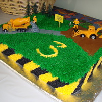 Construction I made this for my three year old..he LOVED it! Thanks for all the wonderful construction cakes on here to gather ideas from!! Sorry I don...