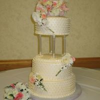 Wedding Cake I Made 4/26/08 This was my first tiered wedding cake. I was pretty happy with the results