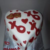 100_5208.jpg Yellow cake, vanilla buttercream, XO made from cookie cutter and bears made out of clay mold...