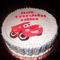 Cars The Movie Italian Meringue, three electric blue tones, car was prepared with fondant in layers. Love Italian Meringue! :)