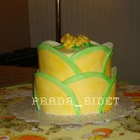 Lemon15-2.jpg My first tiered cake and first experience using plastic chocolate. Somewhat similar to using fondant. All edible. And the cake is.........