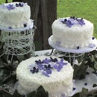 Lacey In Purple 3 round cakes lacey look on top with purple gum paste flowers