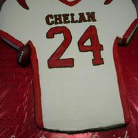 Football Jersey My first carved cake. Almost a full sheet cake (4 individual cakes), half chocolate half carrot with bavarian cream filling and crusting...