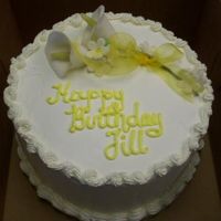 Calla Lilly Cake White cake with raspberry filling and Sharon Z. buttercream icing. My first attempt at calla lillies.