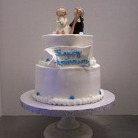 Anniversary Cake Top tier, chocolate with crushed oreo bettercream filling. Bottom tier, white cake with raspberry filling. Iced with Sharon Z. buttercream...