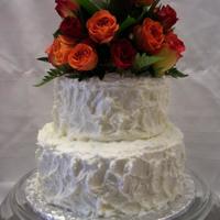 Wedding Red velvet with Decorator's Cream Cheese Frosting. This is my first paid for wedding cake, the bride gave me a picture of a cake that...