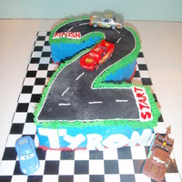 Number 2 Cars Cake inspired by fellow CC idea's this was for my son's 2nd birthday who loves Cars.Buttercream & fondant icing and used the...