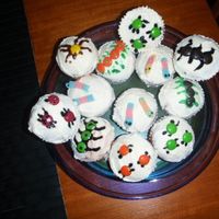 Bugs Cupcakes Made to go with the "bugs" theme for my son's 1st Birthday, he had a catapillar cake