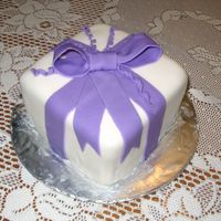 Wilton Iii Class Cake 6 inch square "gift box" cake covered in fondant.