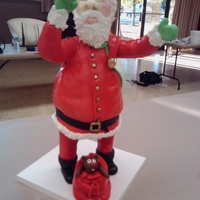 3D Santa Claus Santa done with cake, candy clay and covered in fondant.