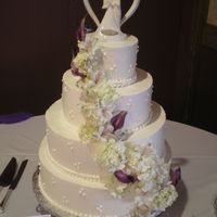Cascade Fresh hydrangeas, purple callas and purple accented lilies beautifully cascade down to finish this classic cake. Cream cheese italian...