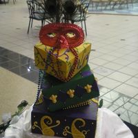 Mardi Gras topsy turvy mardi gras cake made for a bridal show