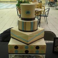 Mahogany buttercream with fondant accents