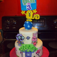 Wow Wow Wubbzy! This is a Wow Wow Wubbzy cake I made for my daughter. It is covered in MMF and the characters are made out of gumpaste.