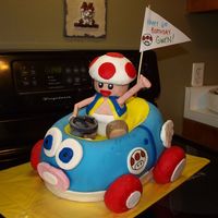 Toad Mario Kart Cake This is a cake I made for my daughter's birthday. I had so much fun making this cake and she loved it.