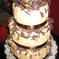 Fall Berries Cream Fondant & piping with edible berries. Berries swags were made with Wilton pearls colored dark purple and then attached to swag...