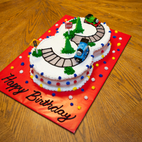 Thomas The Train 3Rd Birthday Cake All BC with toy figures.