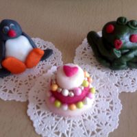 Sugar Paste Figures:pingu And The Kissing Frog I made these as a cake topper