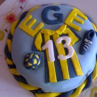Footballer Fan Cake I made this for my 13 year old nephew who is a footballer fan and this cake is made of his favorite team's colours.It is a Turkish...