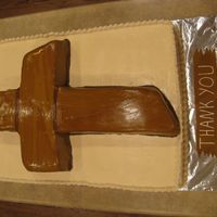 Pastor Appreciation This cake was made for our church's Pastor appreciation celebration. It is a full-sized sheet cake with a large cross on top.