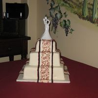 Red, Black And White Wedding I got the idea for this cake out of the Wilton yearbook and tweaked it a little.