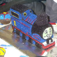 Thomas The Train I made this cake for my son's second birthday. I used the Wilton 3D train pan and just embellished from there.