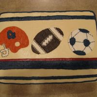 Sports Themed Baby Shower This cake was made for a baby boy baby shower. It is based on the design of the wallpaper border of the baby's room.