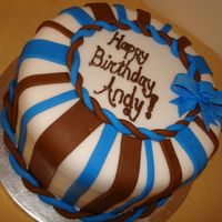 Blue And Brown Birthday 8" 3 layer chocolate cake for my brother-in-law's birthday. All decorations fondant.